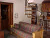 cozy couch & spiral stairs.JPG (58794 bytes)